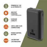 A dark gray Gobi portable power bank shown on a split white and olive-green background with feature callouts for 5V/7.4V/12V output, 30W fast charging, 6500mAh capacity, USB-A/USB-C/DC connections, power control button, and LED battery life indicator.