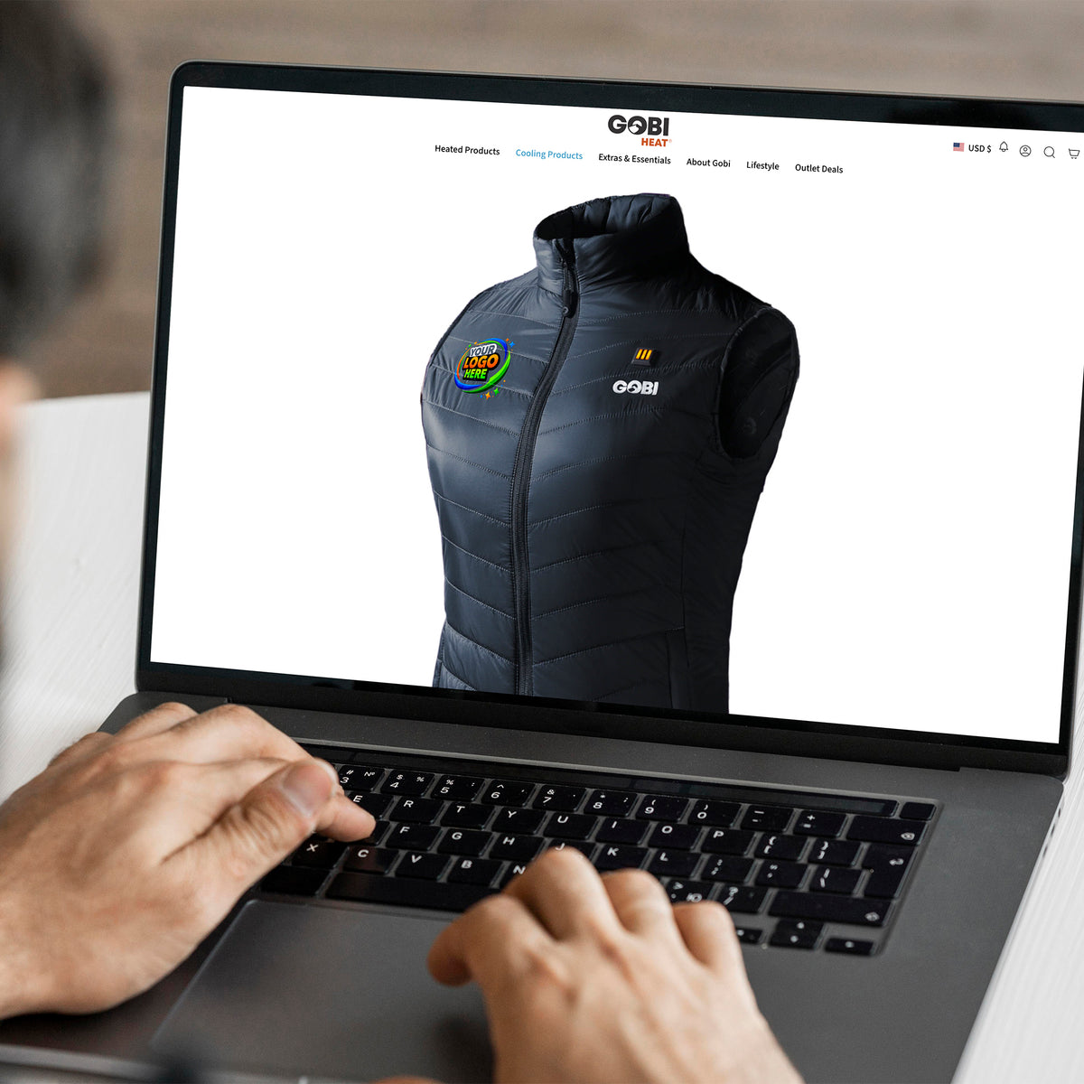 Person using a laptop with a Gobi vest displayed on the screen