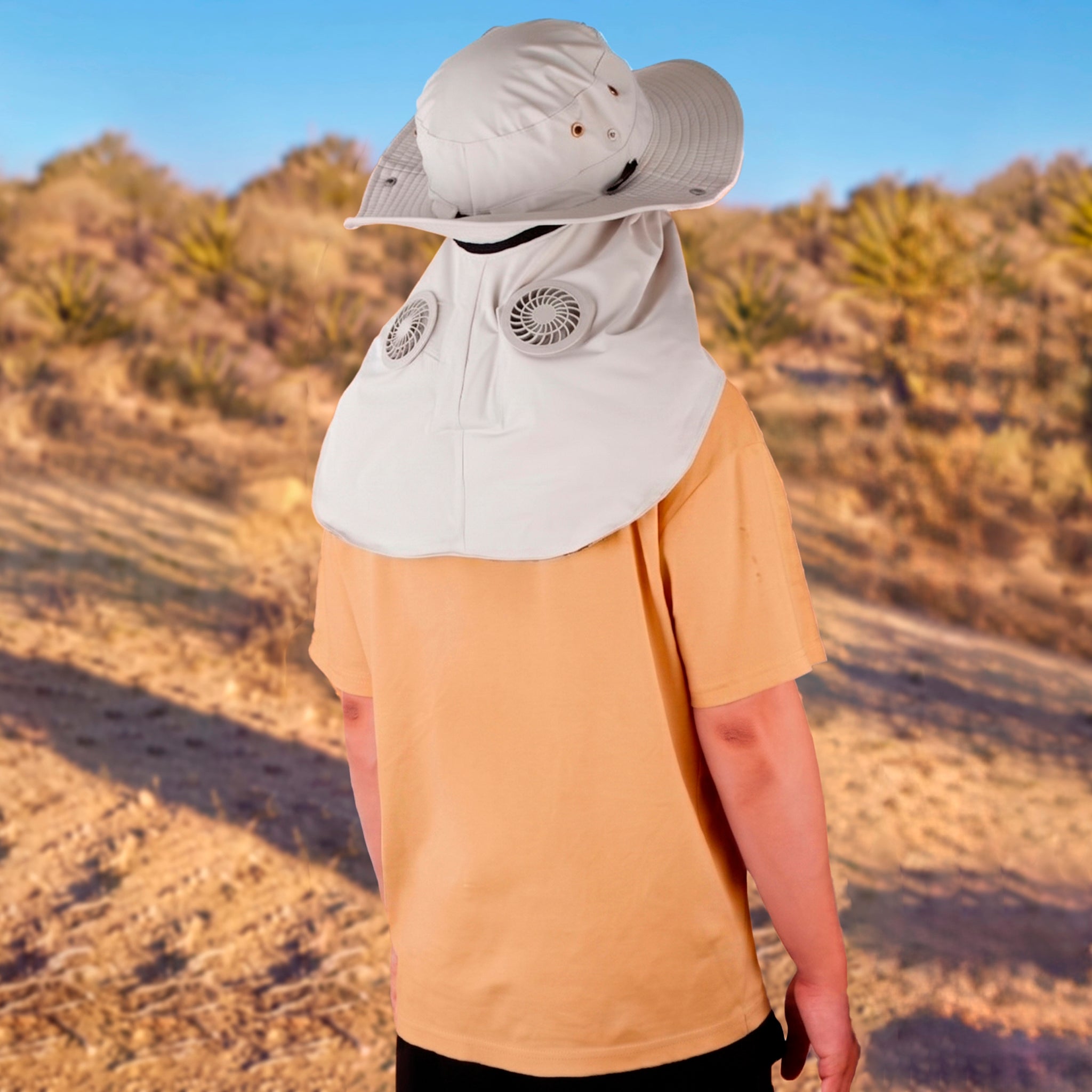 Breza Sun Hat in Sand - man wearing sun hat outdoors lifestyle